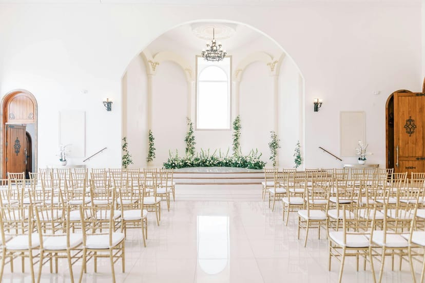 Elegant wedding venue in Citadel Houston with floral backdrop and airy architecture.