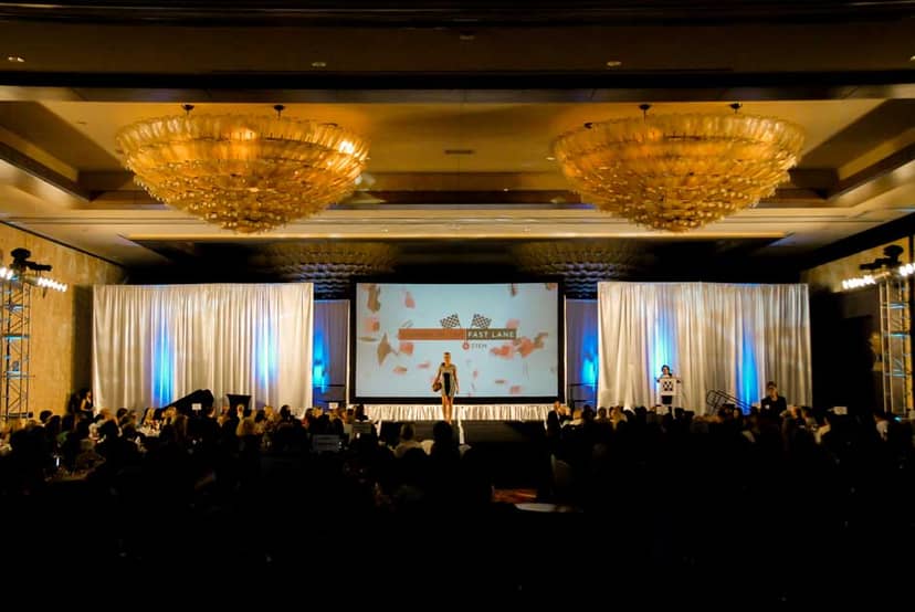Event Hall in Houston with central stage, ideal for professional gatherings and presentations.