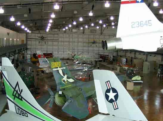 Conference Room at Frontiers of Flight Museum with vintage aircraft for unique events.