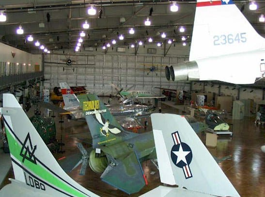 Conference Room at Frontiers of Flight Museum with vintage aircraft for unique events.