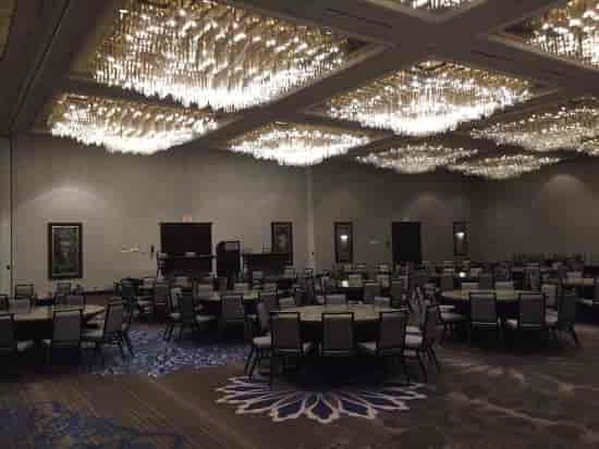 Elegant ballroom at Hilton Fort Worth with chandeliers for weddings and banquets.