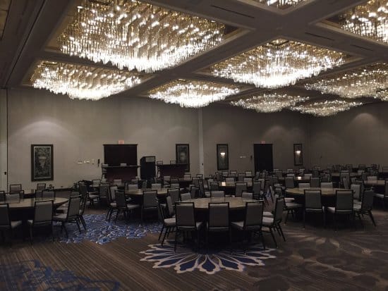 Elegant ballroom at Hilton Fort Worth with chandeliers for weddings and banquets.
