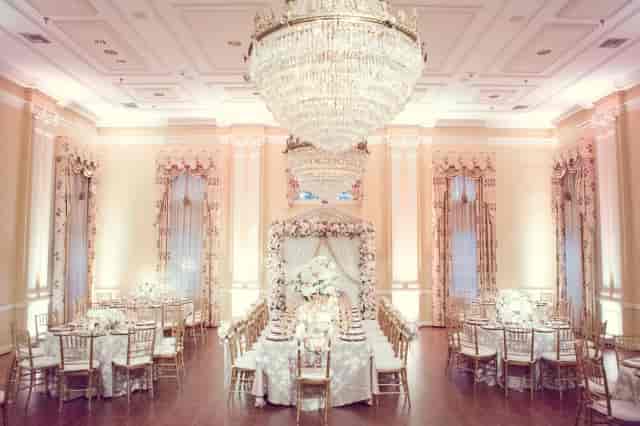 Elegant Arlington Hall ballroom with chandeliers, perfect for weddings and events.