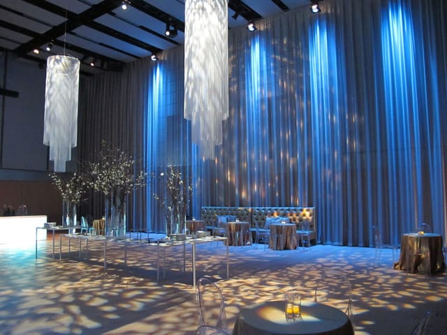 Elegant Hamon Hall with blue lighting, perfect for high-end cocktail parties and galas.