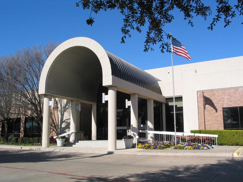 Modern Conference Hall entrance with archway, ideal for corporate and social events.
