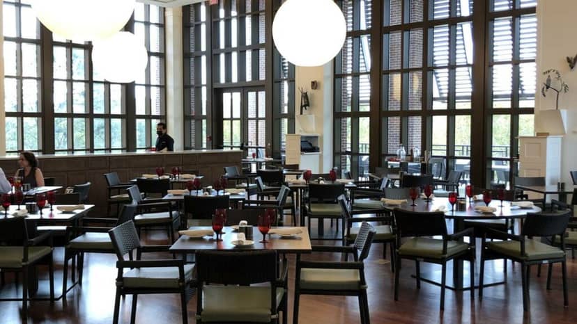Café 43 event space at Bush Center, modern tables and lighting for gatherings.