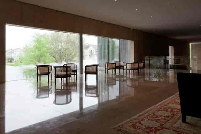 Water Garden Terrace at Asia Society Texas, modern meeting space with large windows, tranquil setting.
