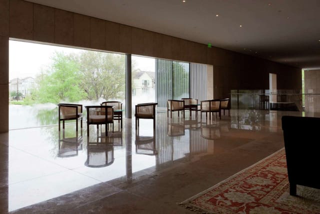 Water Garden Terrace at Asia Society Texas, modern meeting space with large windows, tranquil setting.