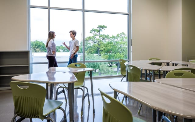 Modern Houston cafeteria with flexible seating for workshops and gatherings.