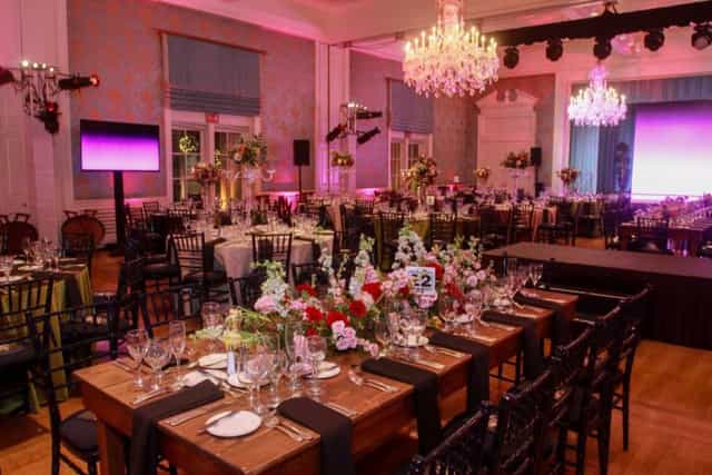 Elegant event space in The Junior League of Houston with floral centerpieces for galas.