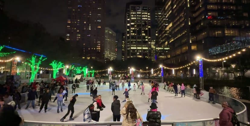 Vibrant H-E-B ice skating rink at Discovery Green for winter events and festive gatherings.