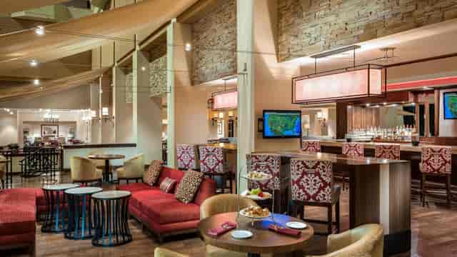 Stylish lounge area at Houston Marriott Westchase for meetings and networking events.