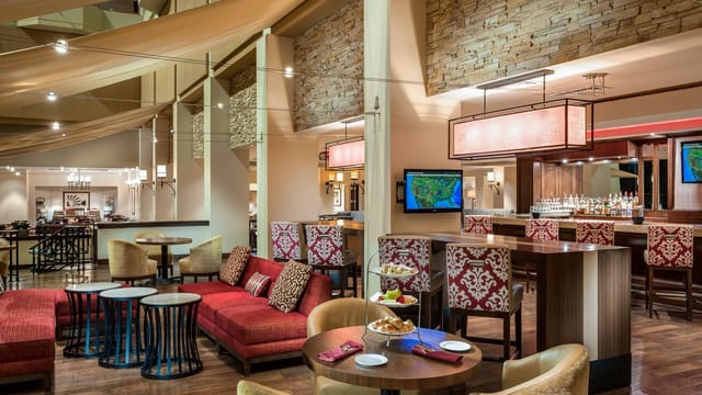 Stylish lounge area at Houston Marriott Westchase for meetings and networking events.