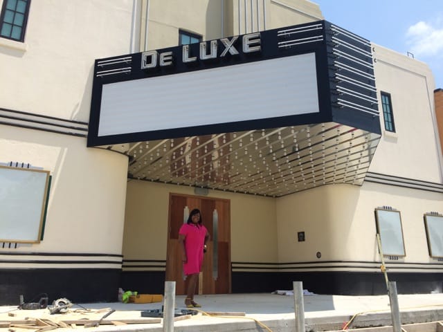 DeLUXE Theater entryway with vintage charm, perfect for stylish events and gatherings.