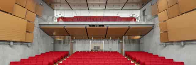 Kimbell Art Museum's Piano Auditorium with tiered red seating, ideal for events and performances.