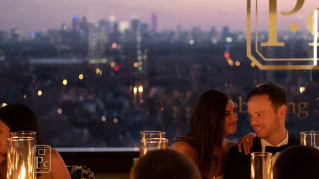 Elegant Onyx Lounge evening event with city skyline, perfect for upscale networking.