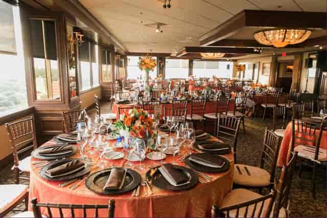 Elegant banquet space with floral centerpieces for upscale events in Park City Club.