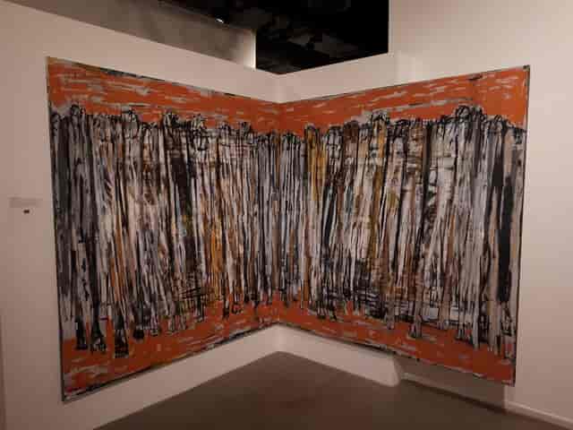 Abstract mural at Gallery Naila, vibrant backdrop for events and meetings.