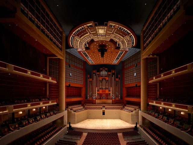 Eugene McDermott Concert Hall with ornate lighting, ideal for performances and conferences.