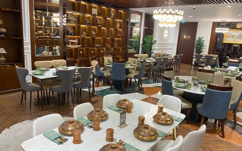 Elegant dining space at Saffron Roots for corporate meetings and upscale events.