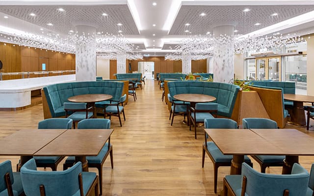 Private dining room at Saffron Roots, modern event space for gatherings and meetings.