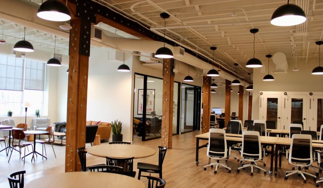 Versatile event space with natural light, ideal for workshops and seminars.