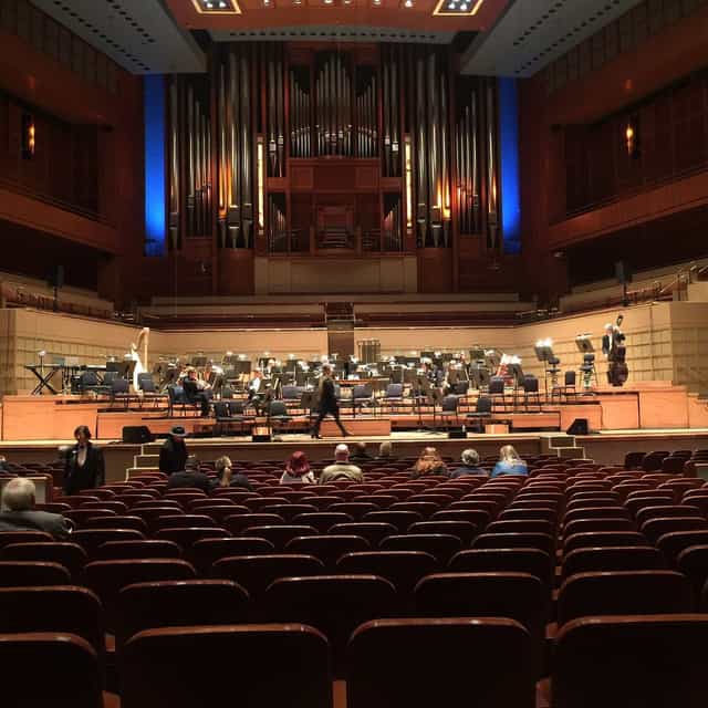 Horchow Hall concert venue with elegant lighting, ideal for orchestral performances and events.