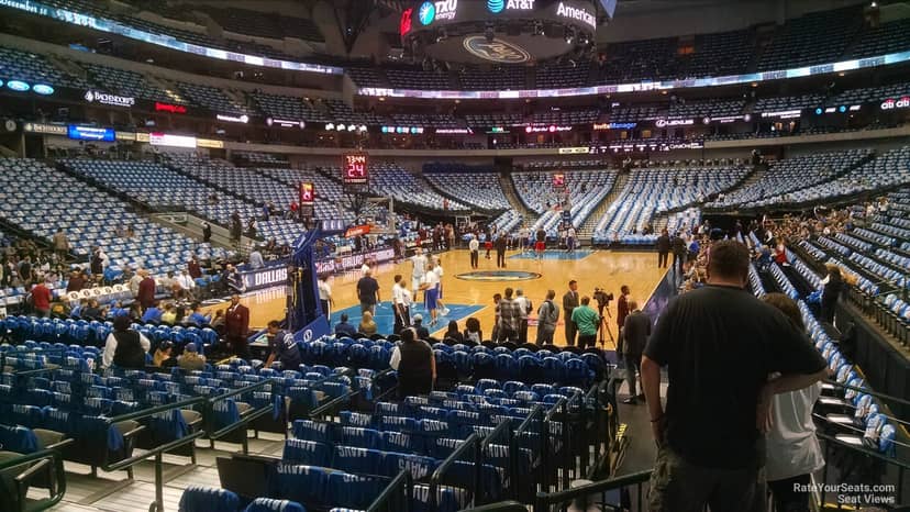 Patrón Tequileria setup for corporate event at American Airlines Center, empty seats and court.