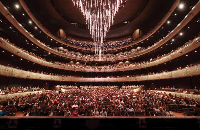 Winspear Opera House auditorium with elegant chandelier, perfect for large events.