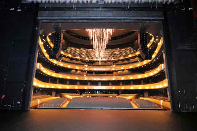 Margaret McDermott Hall with elegant chandelier, ideal for upscale performances and events.