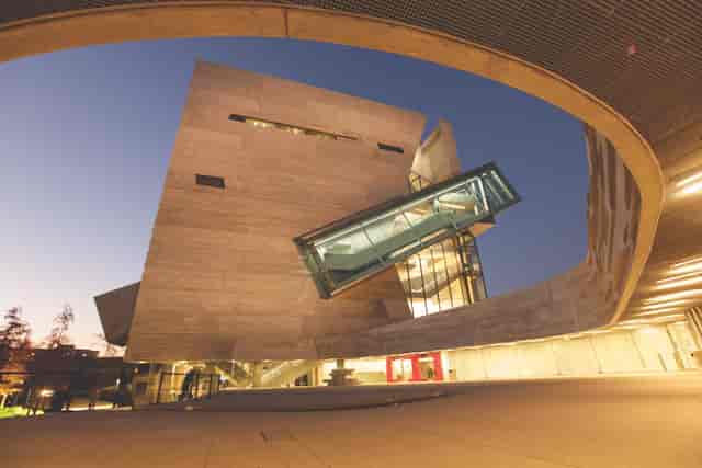 Modern Perot Museum building with unique design, perfect for conferences and exhibitions.