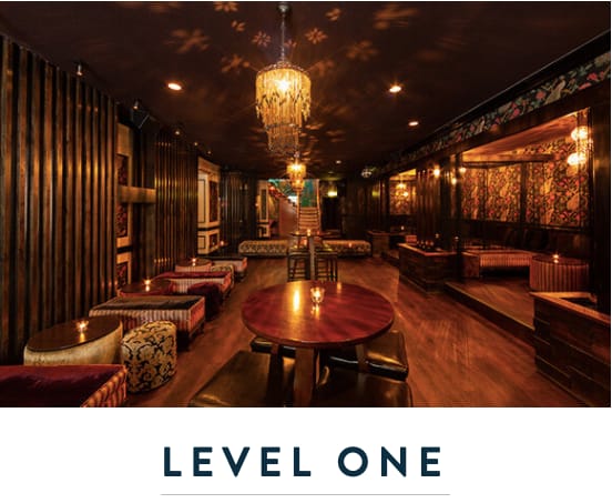 Stylish event space with warm lighting, perfect for networking or private gatherings.