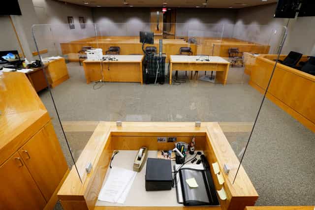 Dallas County Jury Room with glass partitions for meetings and events, emphasizing acoustics.