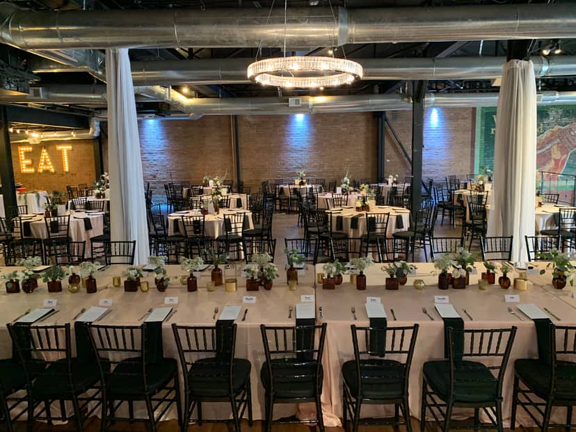 Elegant banquet setup with floral centerpieces for corporate events and weddings.