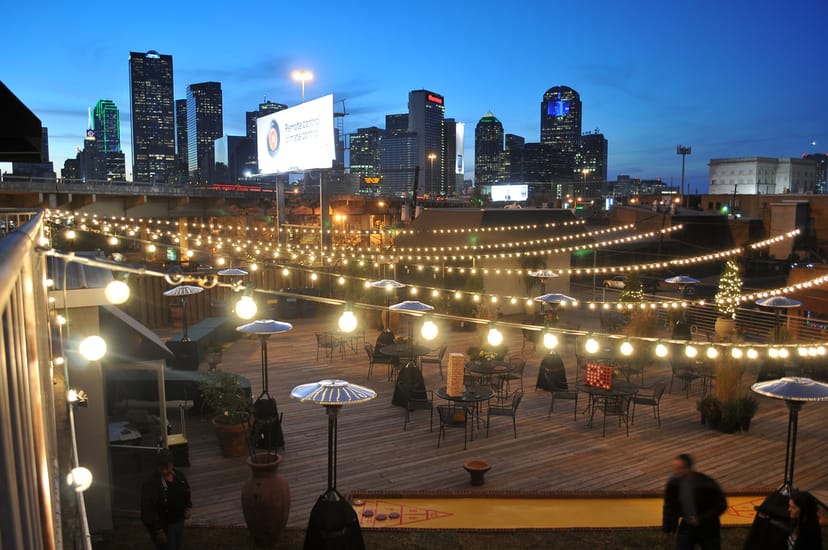 Rooftop deck at 2616 Commerce Center with skyline backdrop for events and gatherings.