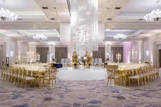 Elegant Ritz-Carlton Dallas event space with chandelier, ideal for weddings and galas.