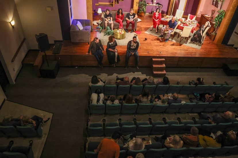 Theater event at Bishop Arts Center with an engaged audience and panel setup.