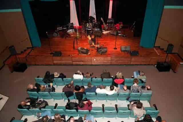 Theater stage set for live performance at Bishop Arts Theatre Center.