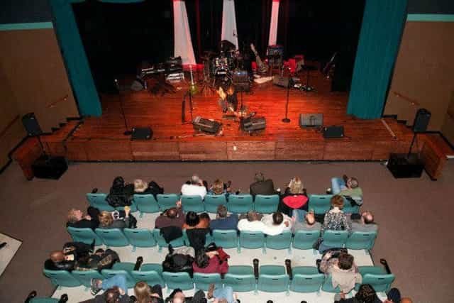 Theater stage set for live performance at Bishop Arts Theatre Center.
