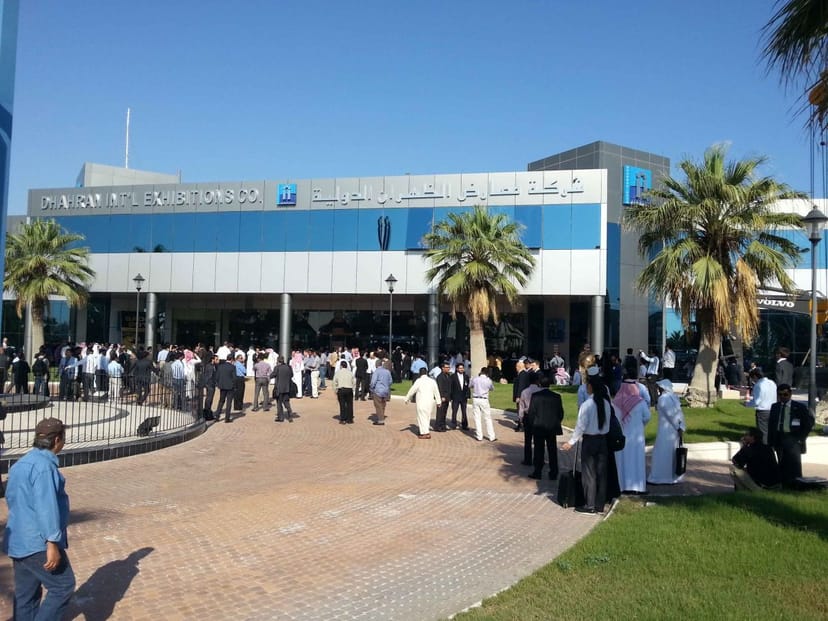 Dhahran Expo Concourse exterior, bustling venue, conference, networking event.