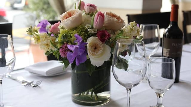 Elegant floral centerpiece at La Pergola private party venue for upscale events.