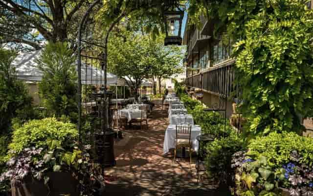 Outdoor dining area at La Pergola, perfect for weddings and corporate events.