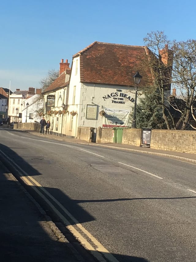 Quaint pub terrace at The Nag's Head, ideal for gatherings and outdoor events by the Thames.
