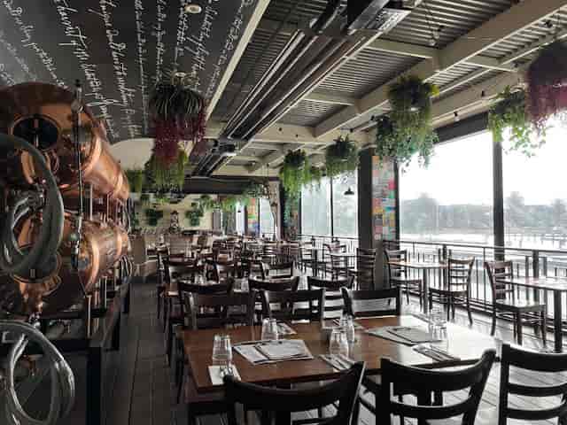 Brasserie room at The Cove Hotel with copper tanks, perfect for social events and meetings.