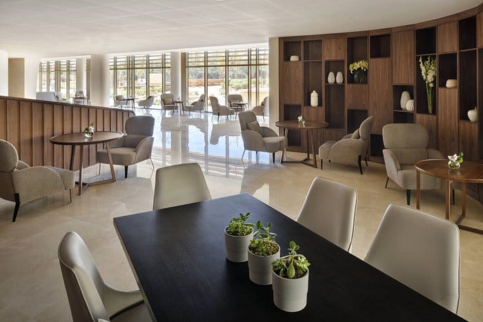 Executive lounge at Marriott Riyadh with stylish seating for networking events.