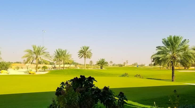 Outdoor terrace at Riyadh Golf Club, featuring lush greenery for corporate retreats and golf tournaments.