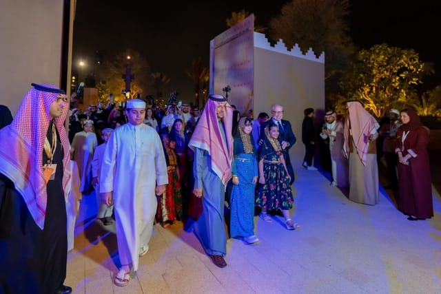 Elegant gathering at Bujairi Terrace, Diriyah - cultural event with traditional attire.