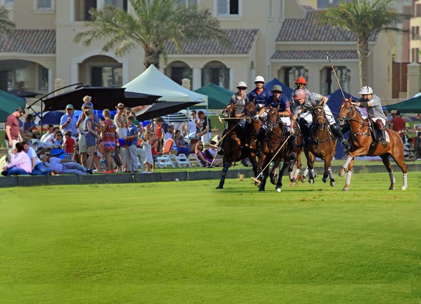 Luxury Stables polo match at Al Habtoor Club with lush greenery and social gatherings.