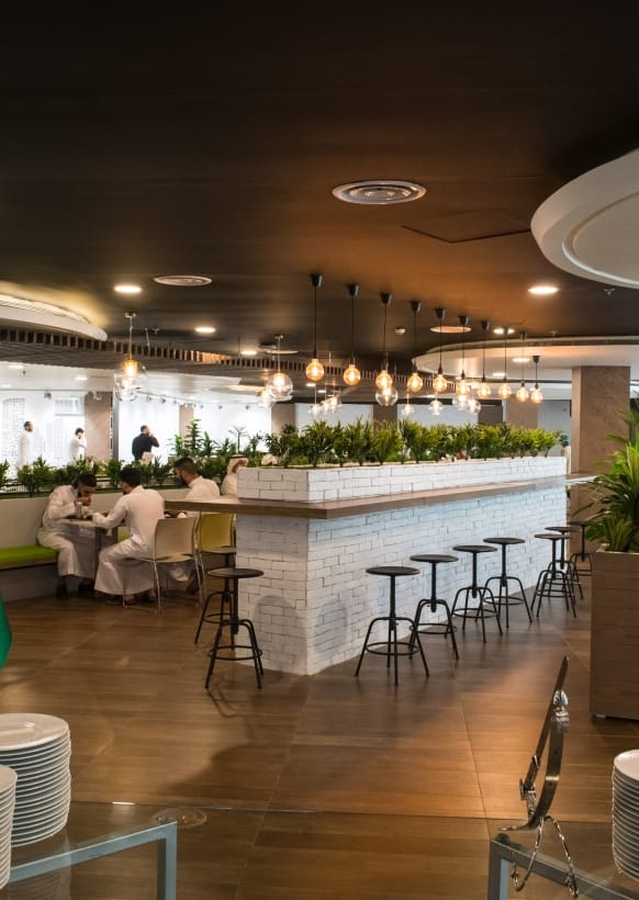 Modern function room with cozy seating for networking events and informal meetings.