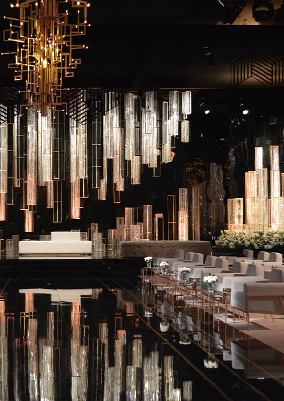Al Tanhat Hall event setup with elegant stage and upscale seating for corporate gatherings.